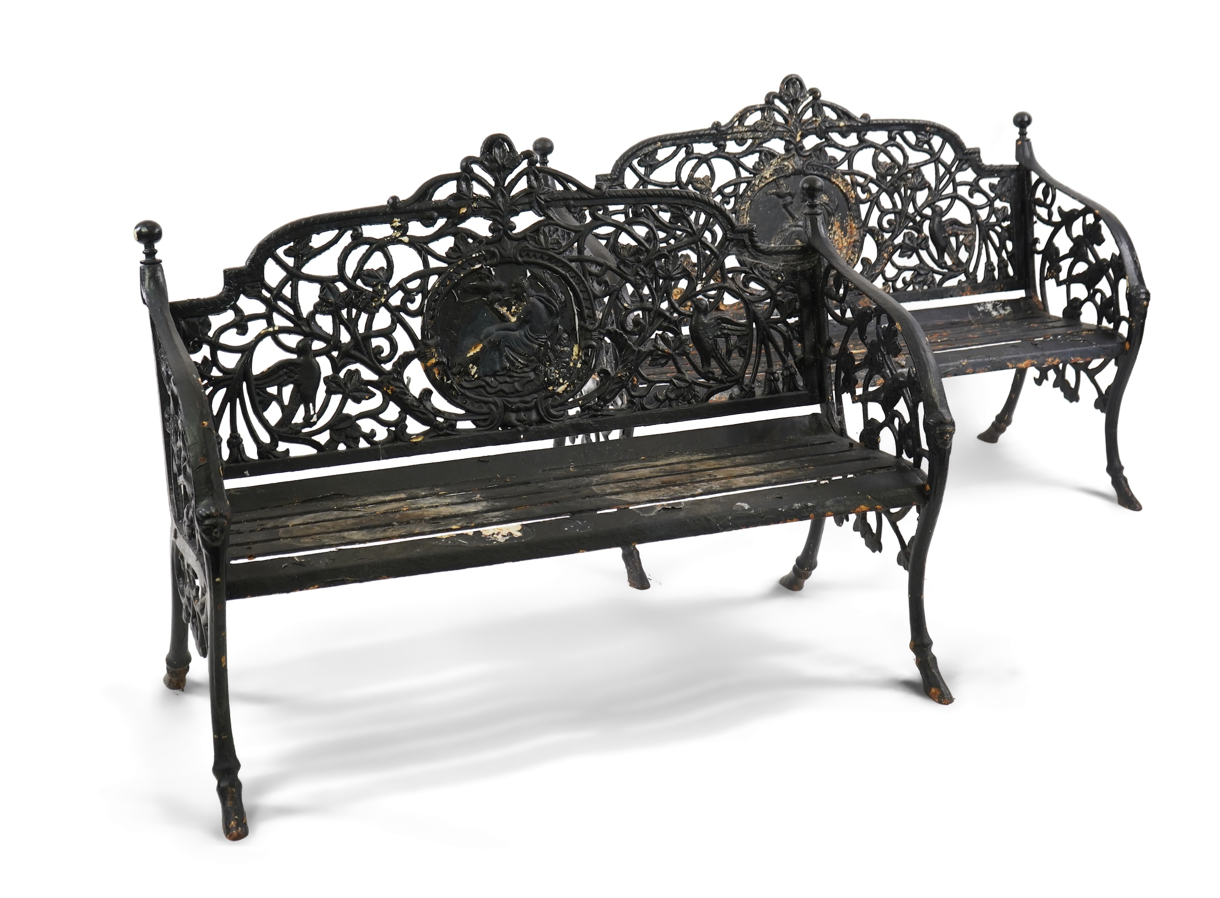 A pair of Victorian Coalbrookdale style painted cast iron medallion garden benches